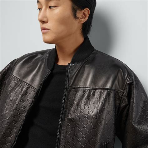 gucci 501141 jacket|GG embossed leather bomber jacket .